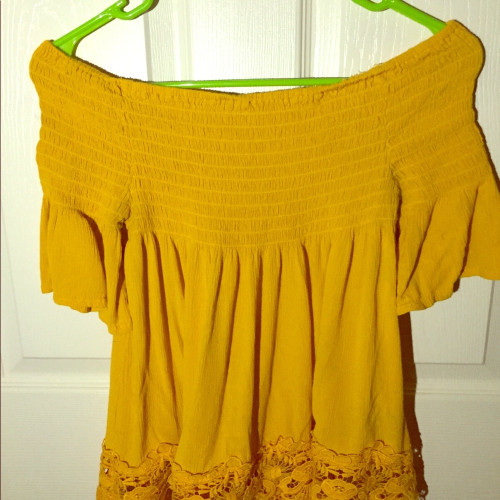 Yellow off shoulders shirt